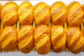cropped image of fresh bread on the counter sold in the store.