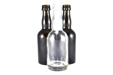 Wine bottles on white background close-up