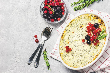 Cottage cheese poppy seed and berries casserole. Top view, space for text.
