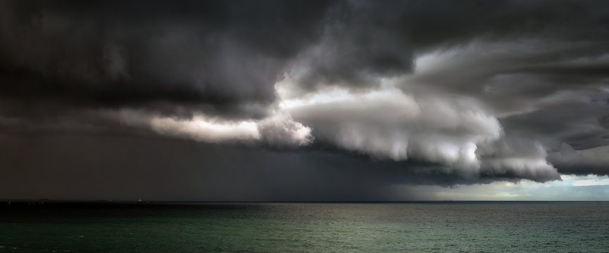 Fototapeta panorama of stormy clouds on the sea