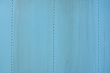 Metal Oberfläche mit Nieten Untergrund blau