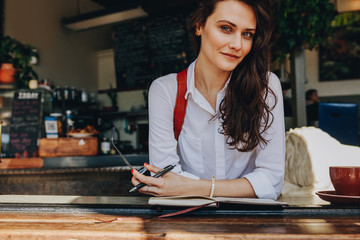 Beautiful woman sitting at coffee shop