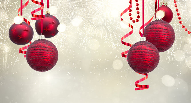 Red christmas balls garland on festive silver background banner