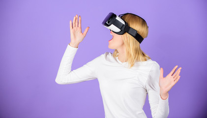 Girl use modern technology vr headset. Explore virtual reality. Digital device and modern opportunities. Woman hold vr headset glasses violet background. Virtual reality and future technologies
