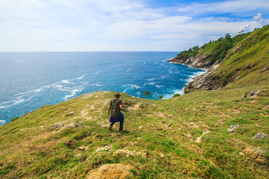 Men love adventure backpack, mountain and sea adventure, Krating Cape View Point in Phuket, Thailand