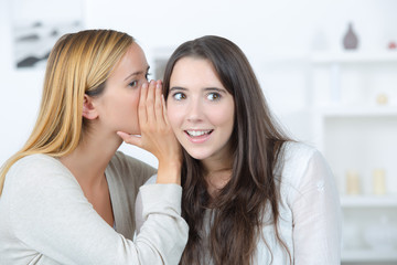 gossip rumour woman telling secrets to your girlfriend