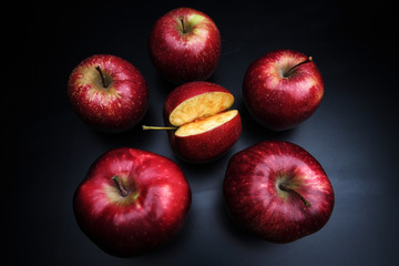 tasty juicy apples on a dark background