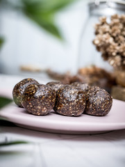 Healthy organic date energy balls with dark chocolate, dried fruits and nuts. Food for healthy lifestyle.