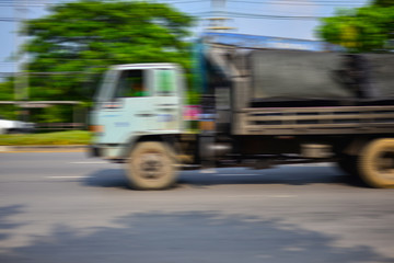 Fototapeta na wymiar Blur motion of the truck transport.