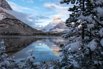Reflection of Mt Henkel in Swiftwater Lake after a snow storm. Glacier National Park, Montana