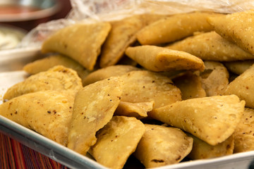 empanda fried corn stuffed with vegetables and meat, food for party and reunion, Latin America. Guatemala.