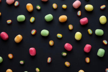 colorful candy on black background