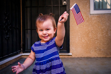 little girl with american flag