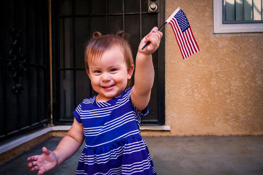 little girl with american flag