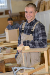 the young carpenter posing