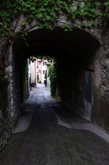 Covered street and arched passage in the Swiss village of Cabbio, Ticino