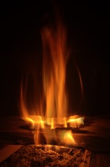 Home fires burning; hearth fire in Italian rustico in Montespertoli, Tuscan region of Florence