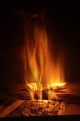 Home fires burning; hearth fire in Italian rustico in Montespertoli, Tuscan region of Florence