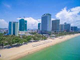  Sun umbrellas at the beautiful beach of Nha Trang city, VietNam