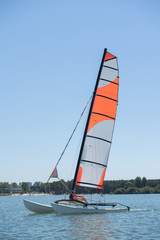 sailing on a lake - summer and sports theme