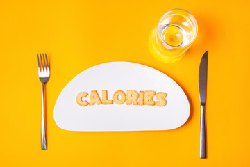 Biscuit letters on porcelain plate, Calories