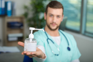 doctor showing a pump bottle