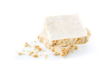 Typical christmas almond nougat isolated on white background