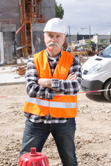 Obraz na płótnie Canvas senior construction manager on building site