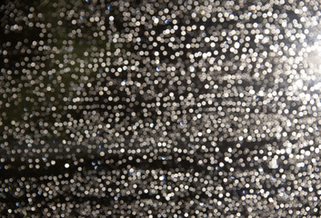 rain drops on the glass in the night