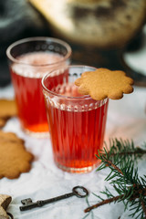 Gingerbread and Glogg, also known as Scandinavian mulled win is a traditional Scandinavian warming drink. Christmas background and concept for design