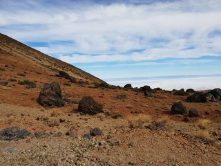 Big lava stones at the hiking trail to the big famous volcano Pico del Teide in Tenerife, Europe