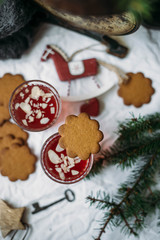 Gingerbread and Glogg, also known as Scandinavian mulled win is a traditional Scandinavian warming drink. Christmas background and concept for design
