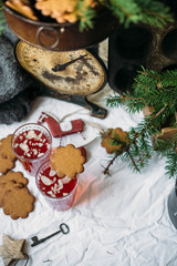 Gingerbread and Glogg, also known as Scandinavian mulled win is a traditional Scandinavian warming drink. Christmas background and concept for design