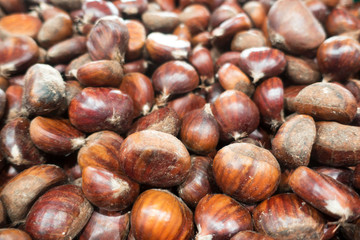 Fresh Organic Chestnuts Background.