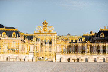 The golden gate of the palace of Versailles in France
