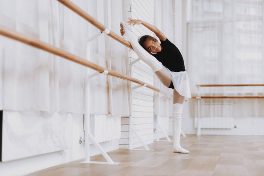 Ballet Training Of Young Girl In Balerina Tutu.