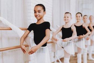 Ballet Training of Group of Young Girls Indoors.