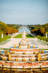 Versailles gardens with Latona fountain and Grand canal during the morning light in Versailles, France - obrazy, fototapety, plakaty