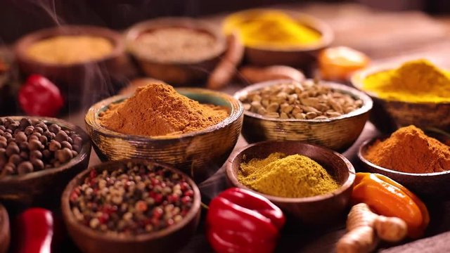 Assorted Spices and wooden bowl of smoke