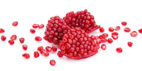 Ripe pomegranate seeds isolated on white