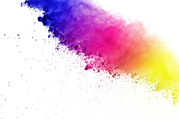 Freeze motion of colored powder explosions isolated on white background.