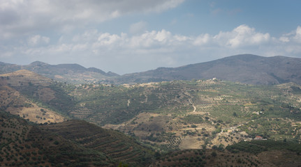 Fototapeta na wymiar Hania, Crete - 09 25 2018: Polirinia. Small mountain. Panoramic view on fields and mountains