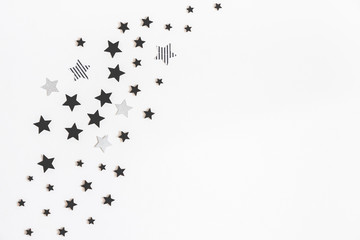 Christmas composition. Christmas black and silver decorations on white background. Flat lay, top view, copy space