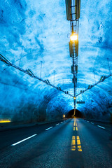 Famous Laerdal Tunnel Blue Lights in Norway. Longest Road Tunnel in the World - 15 Miles connecting...