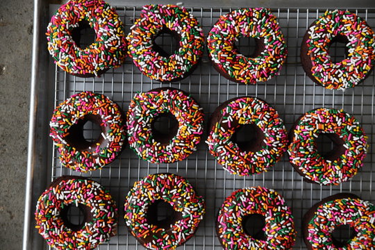 Chocolate doughnuts with sprinkles