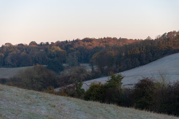 Fototapeta na wymiar Sunrise views of English countryside nerar Shenington, Oxfordshire on a clear and cold frosty morning
