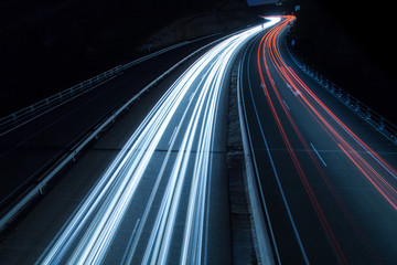 Fototapeta na wymiar Highway car light trails at night