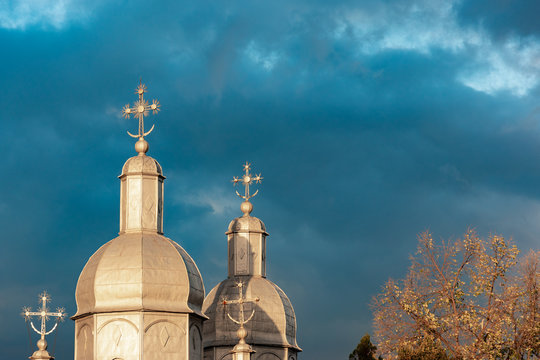 domes of the Orthodox Church with trees
