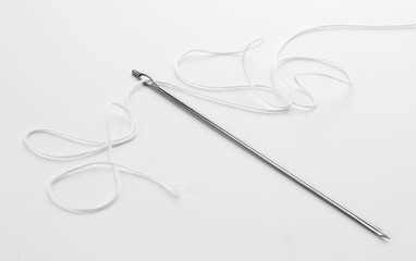 Aguja e hilo para cocinar