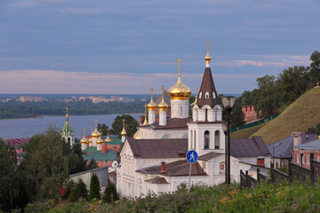 Scenic view at St. Elijah's Church, domes of Church of St. John the Baptist and walls of Nizhny Novgorod Kremlin with Volga river in the background